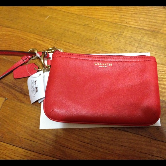 Small red leather coach wristlet