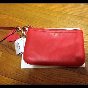 Small red leather coach wristlet