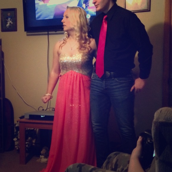 Long pink, and gold sequin dress.