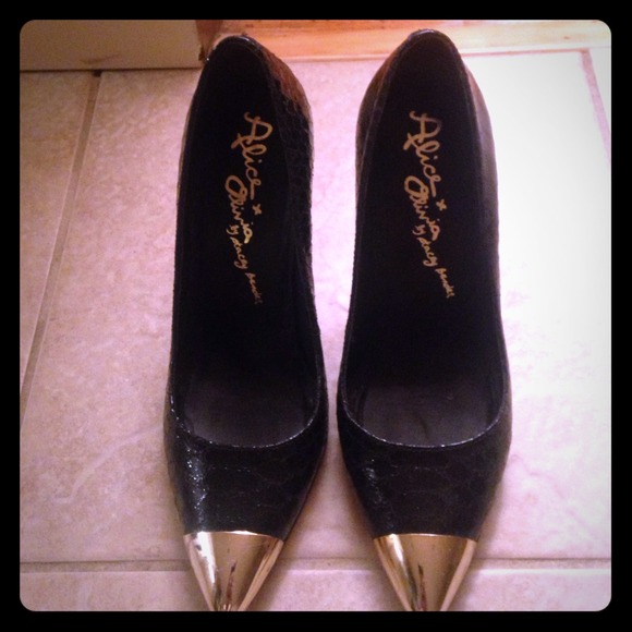 Black leather snakeskin with gold tip pumps
