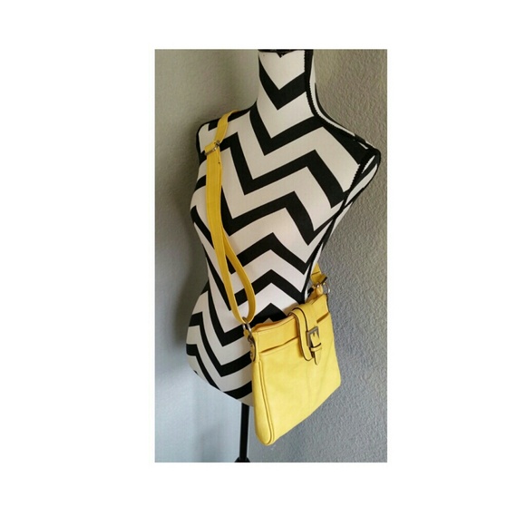 Adjustable, chic yellow purse.
