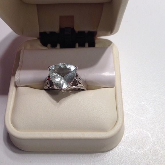 Aquamarine carat plus trilliant cut ring
