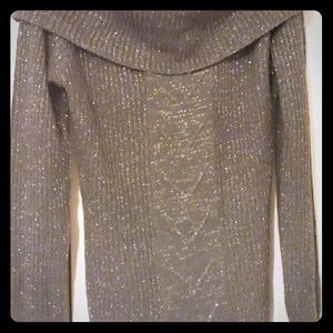 Grey sweater dress with gold thread and cowl neck.