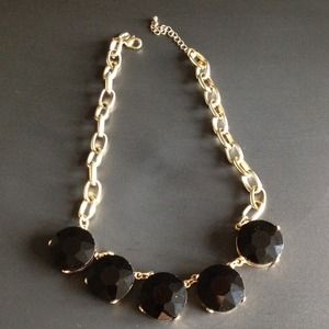 Black & gold necklace.