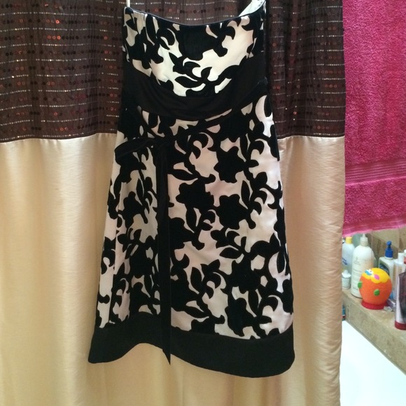 Black and white strapless cocktail dress.