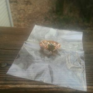 Never worn gp peridot ring nice reflection colors