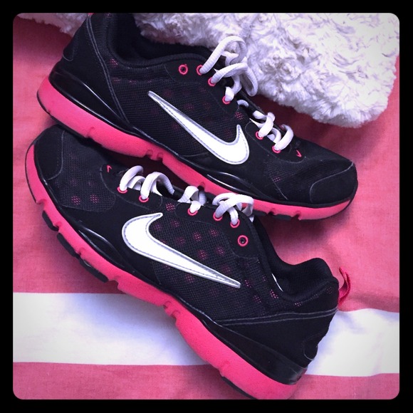 Nike pink and black training shoes