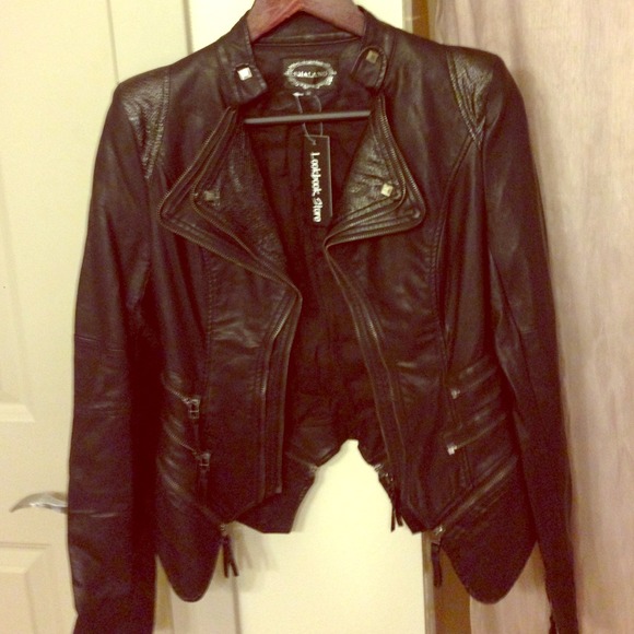 Black leather jacket with stud detailing.