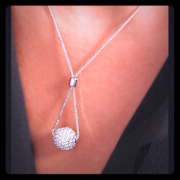 Swarovski blink ball pendant-new