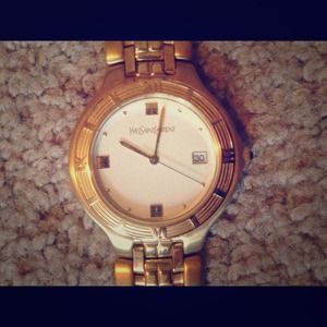 2 Yves Saint Laurent Gold watches