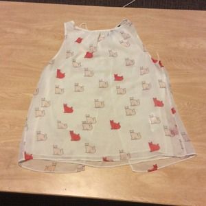 Sleeveless white cat top