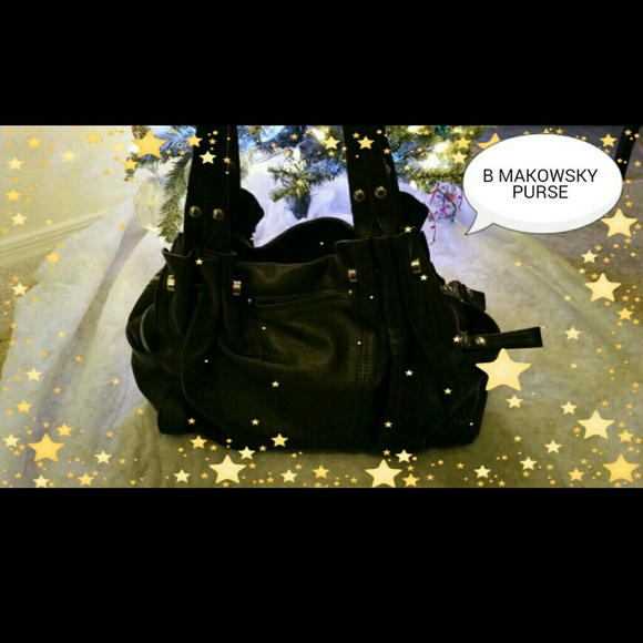 On hold for @aecinco B Makowsky black purse