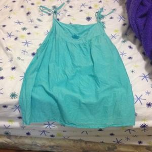 Teal tank top size Medium and worn once or twice.