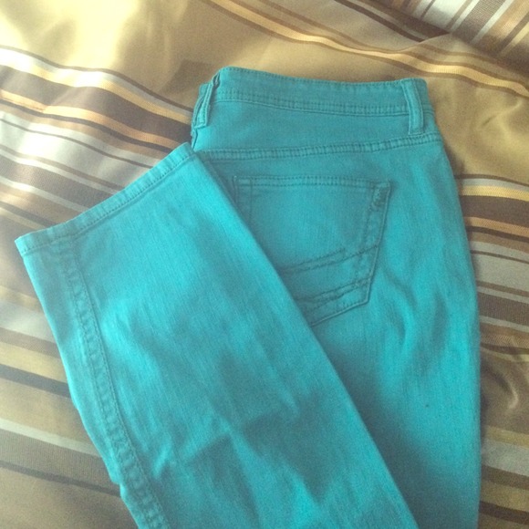 NWOT Teal Skinny Jeans.