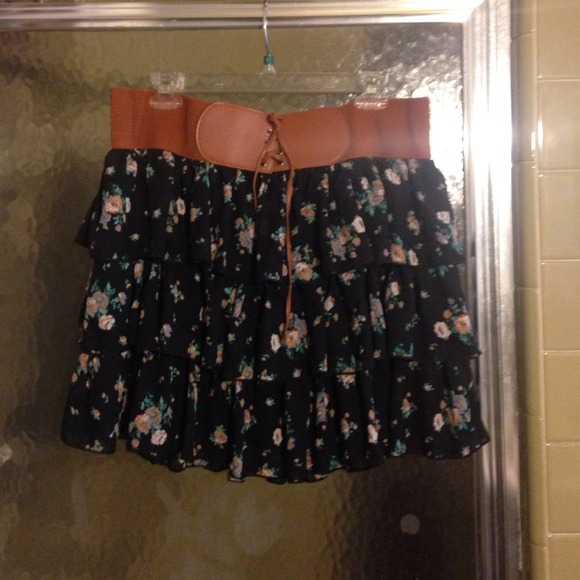 Black floral skirt with brown belt