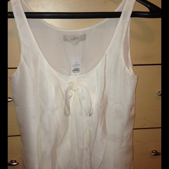 White bowed blouse