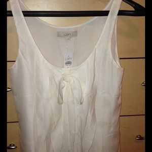 White bowed blouse