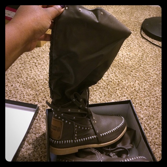 Sam and Jeffrey styled rain boots