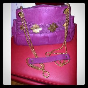 Berry colored cross body purse with gold hardware