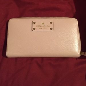 Light pink Kate Spade zip around wallet