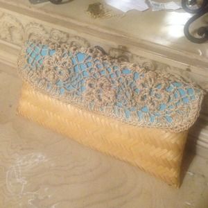 Straw clutch w/teal blue. Brand New $75