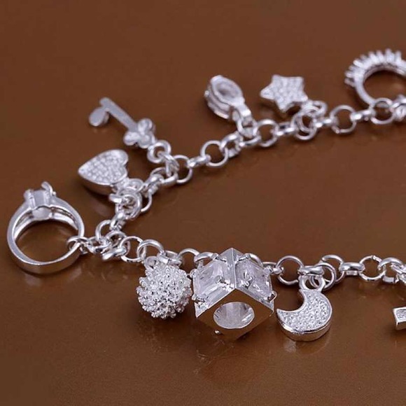 Fashion Jewelry - 🎉HP🎉Bracelet With Fashion Charms