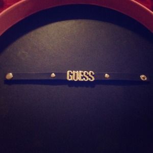 Black Leather with silver Guess logo bracelet