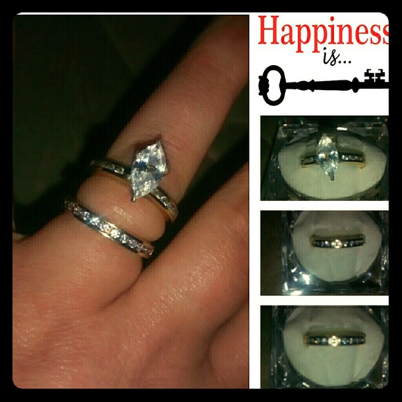 Cubic zirconium engagement/wedding band set.
