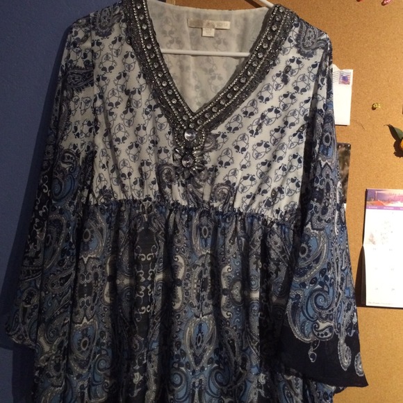 Blue and white with beading around neck line