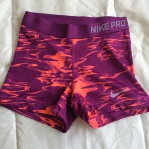 Purple and Orange Nike Pro Shorts