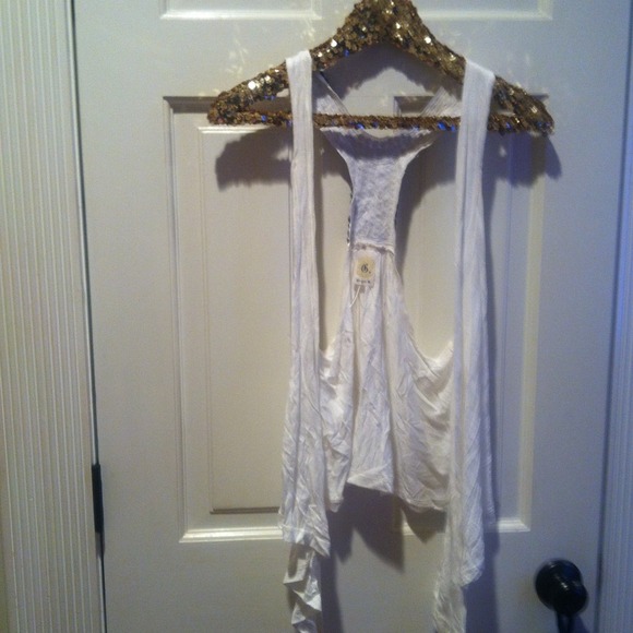 White with studs on back vest