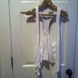 White with studs on back vest