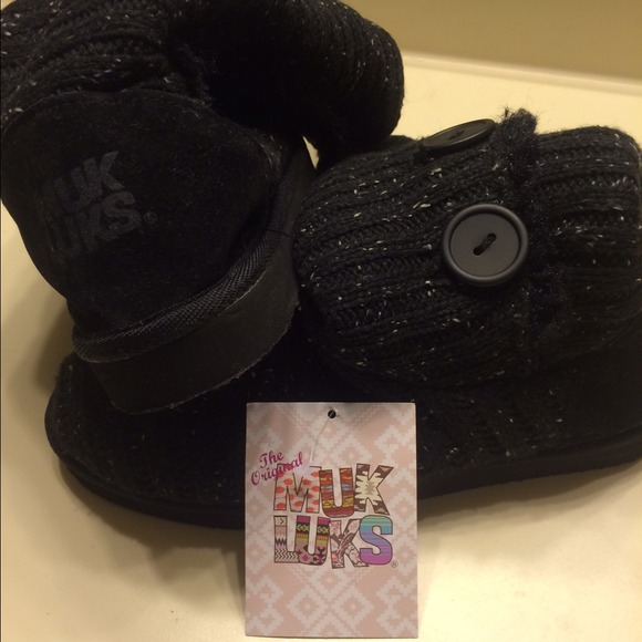 Black Muk Luk boots.