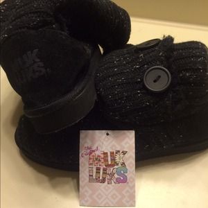 Black Muk Luk boots.