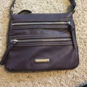 A purple Nine West cross body bag