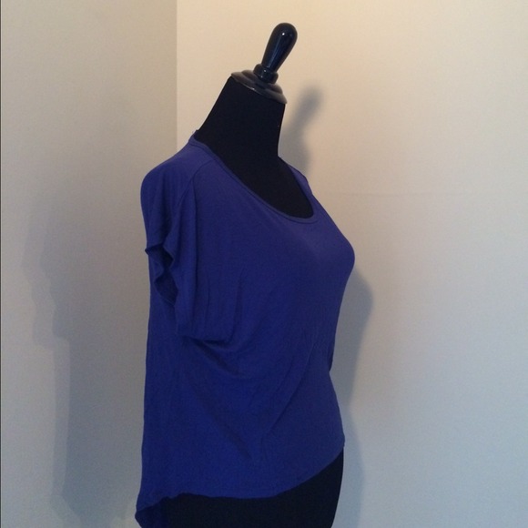 Indigo colored top with tail-back🎄