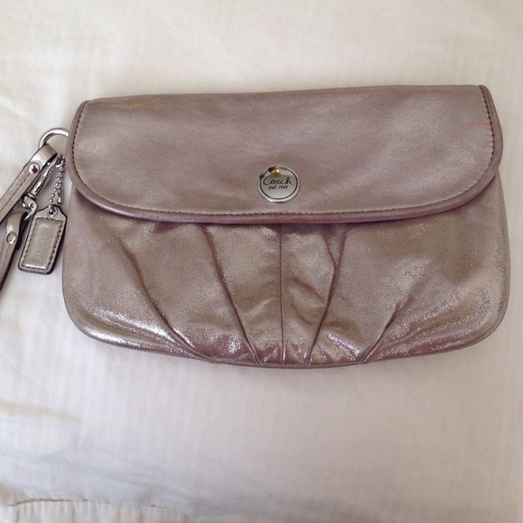 Authentic coach clutch