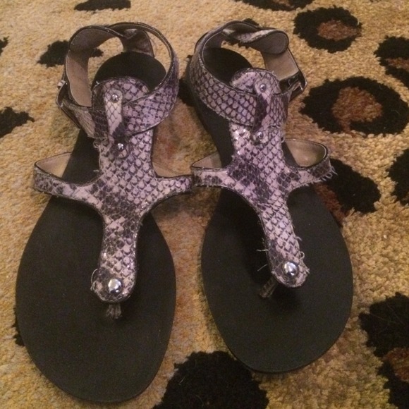 Snake skin alligator sandals.