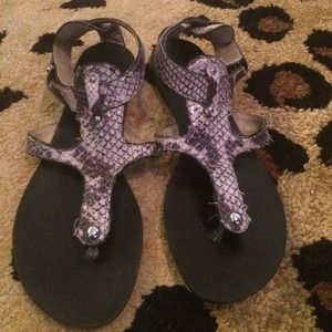 Snake skin alligator sandals.