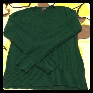 Green sweater. Warm.