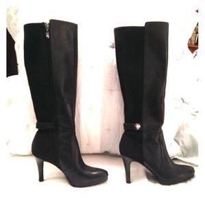 Tahari zip up boots.