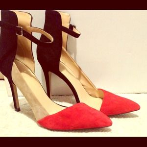 Black, red, and nude color block heels.