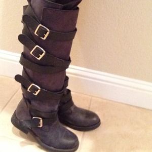 Steven madden tall black buckle boots.