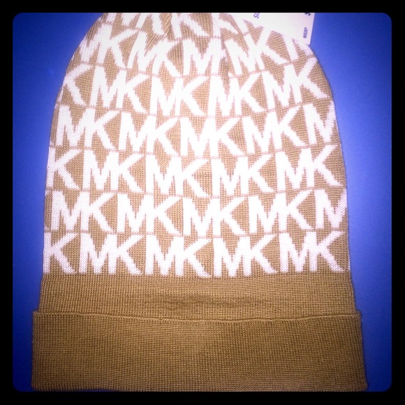 Michael Kors Outerwear - NWT Michael Kors Tan & White beanie winter hat