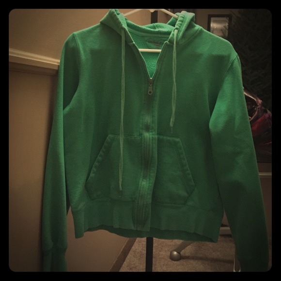 Cute green hooded zip up sweatshirt.