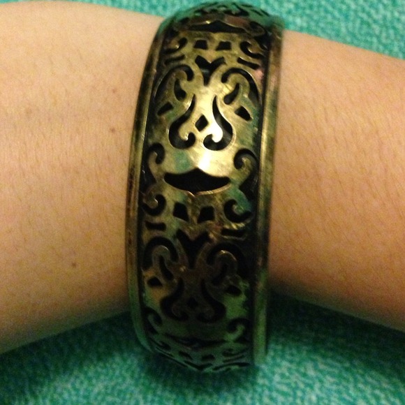 Old looking gold bracelet with Cut out design