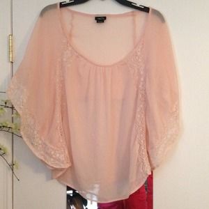 Sheer angel arm top