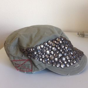 Military style cap with drab green sparkly detail