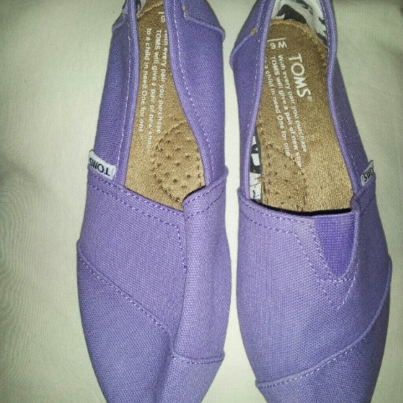 Never been worn, TOMS lavender slip ons