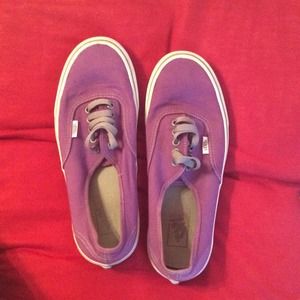 Purple Vans with dark grey laces
